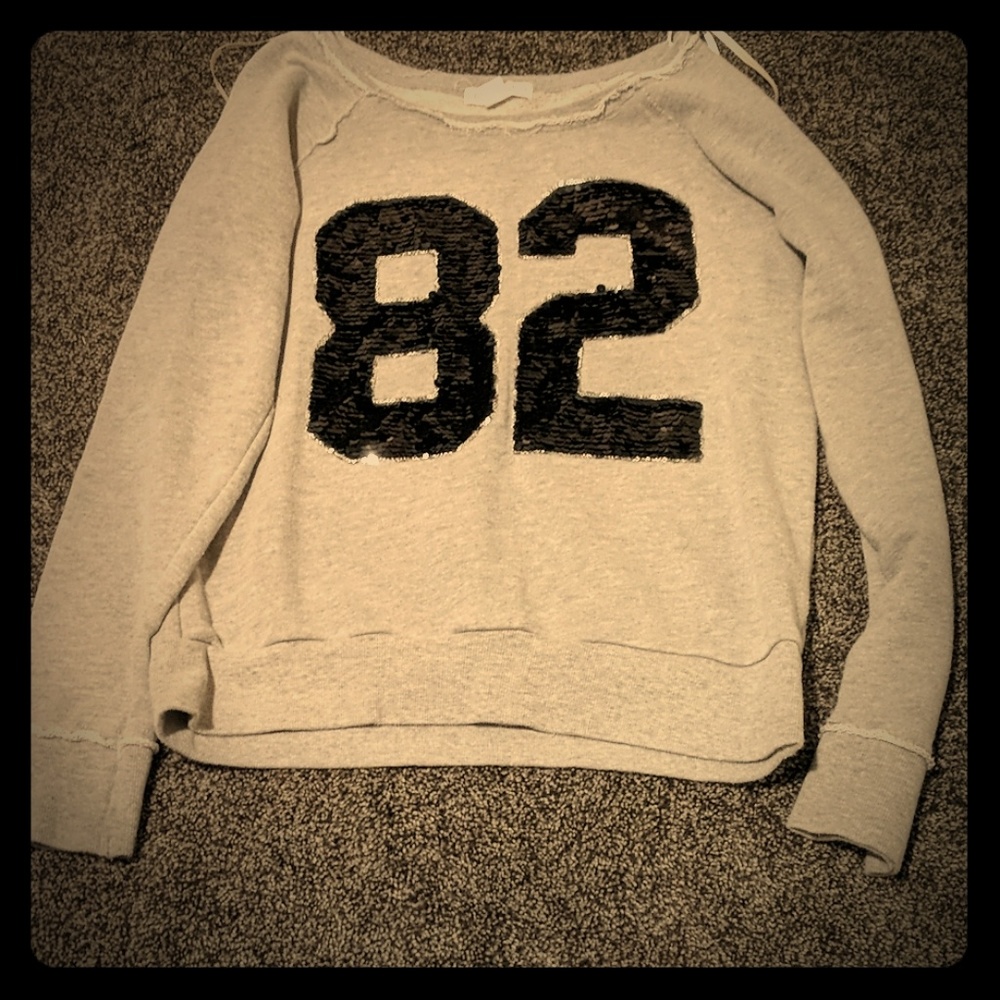 A grey 82 sweater